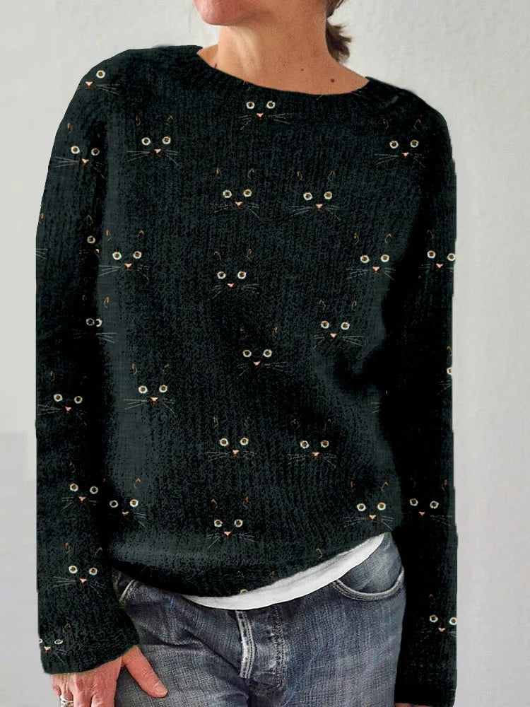 Cozy sweater with round neckline and cute cat face print