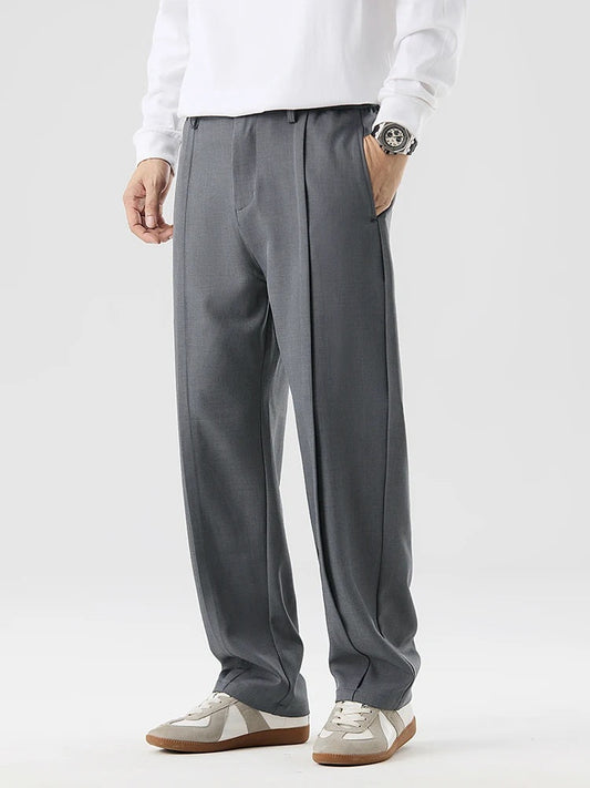 Teo - Wide-Leg Pleated Trousers